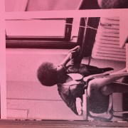 Picture. of Dr. Benita Junette Brown sitting in a chair in a classroom at Gratz High School in 1972.